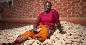Lilian sitting with her maize