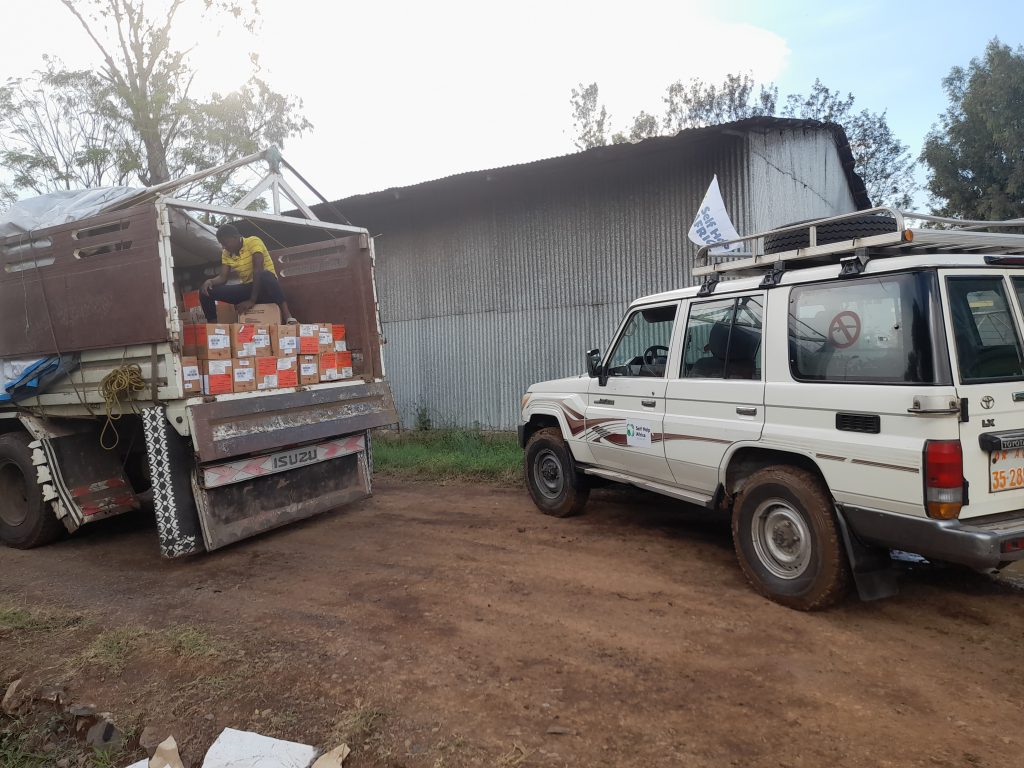 Self Help Africa staff delivering aid in Amhara